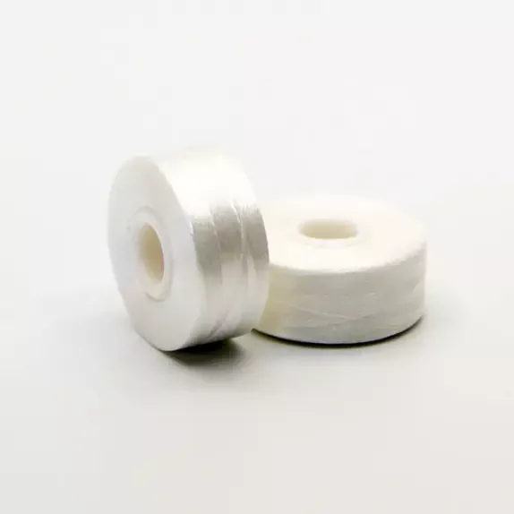 Ubi abscondita fabrica fabricae plumarii proveniunt ex filo substandard bobbin?